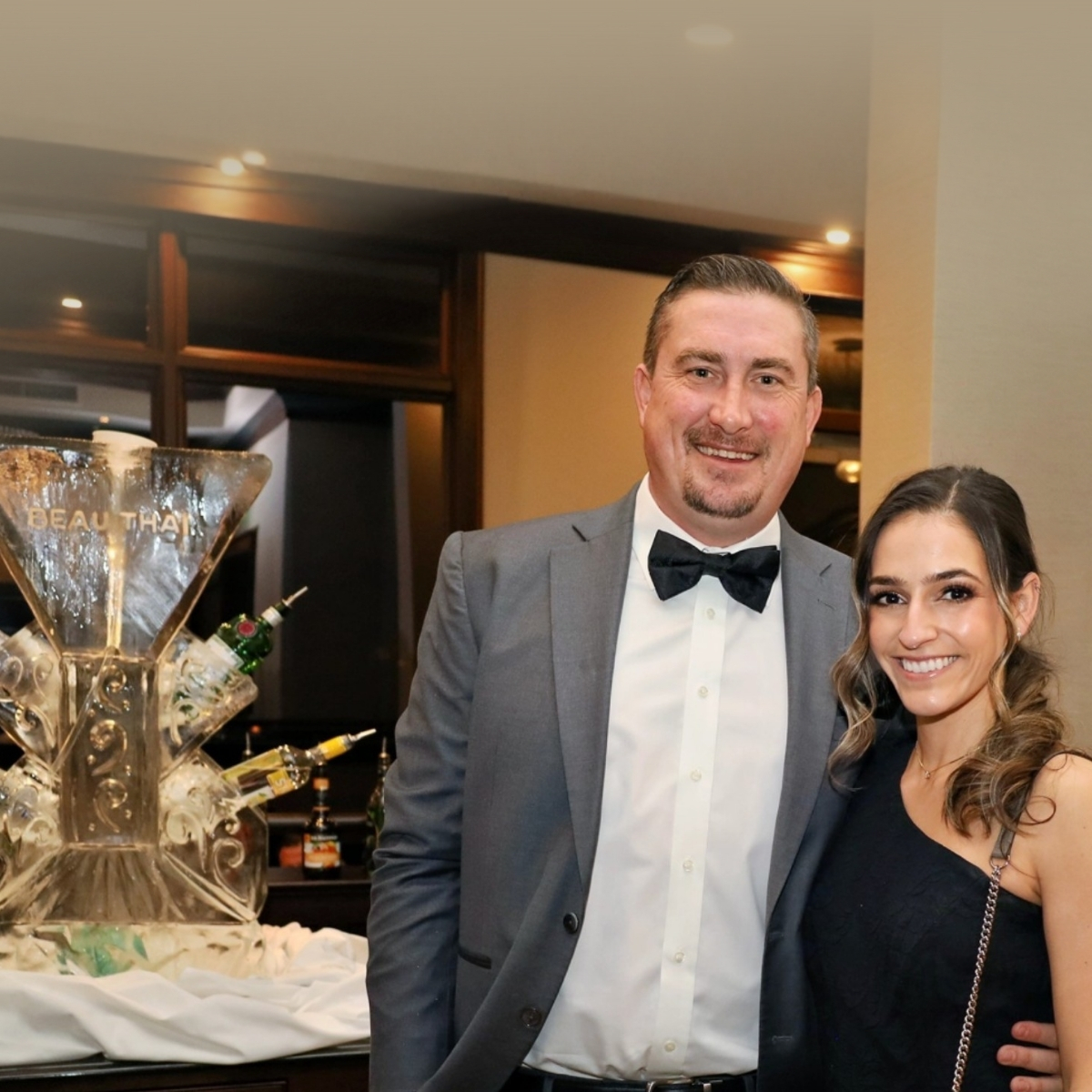 Picture of a couple at the Beau Thai Ball with Martini Luge